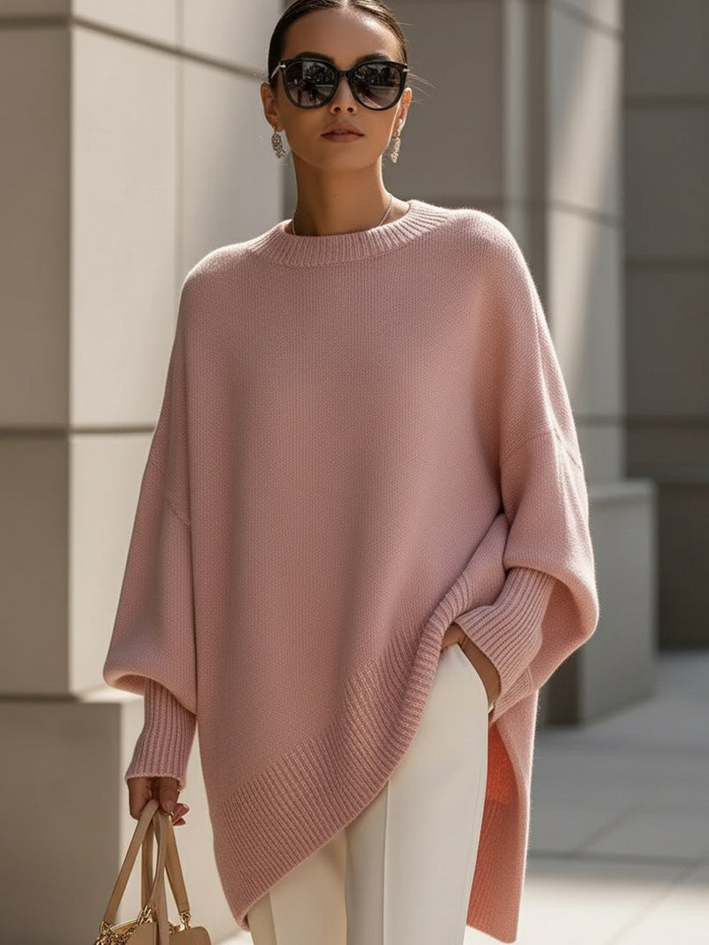 Gebreide oversized trui dames met vleermuismouwen en asymmetrische zoom