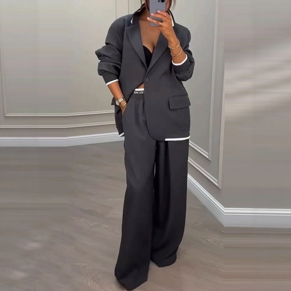 Tweedelige set dames met oversized blazer en wijde broek