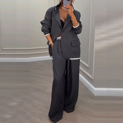 Tweedelige set dames met oversized blazer en wijde broek