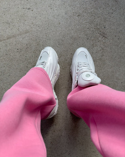 Flared joggingbroek met enkelritsen en elastische tailleband