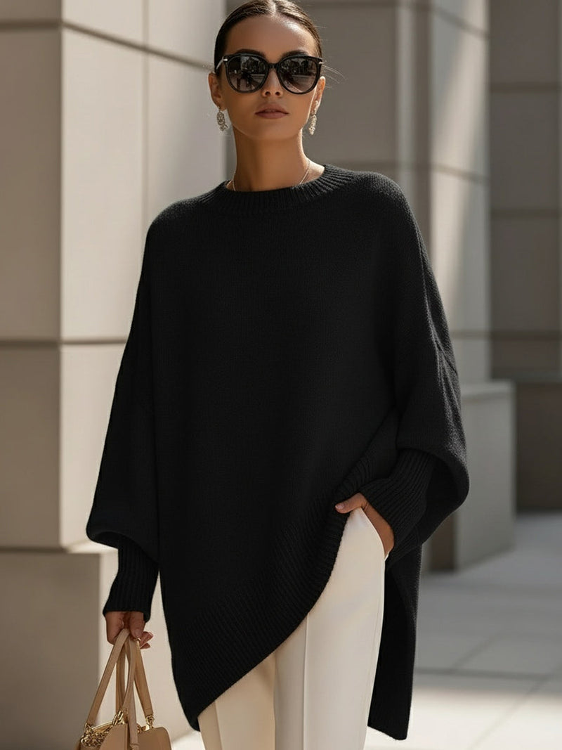 Gebreide oversized trui dames met vleermuismouwen en asymmetrische zoom