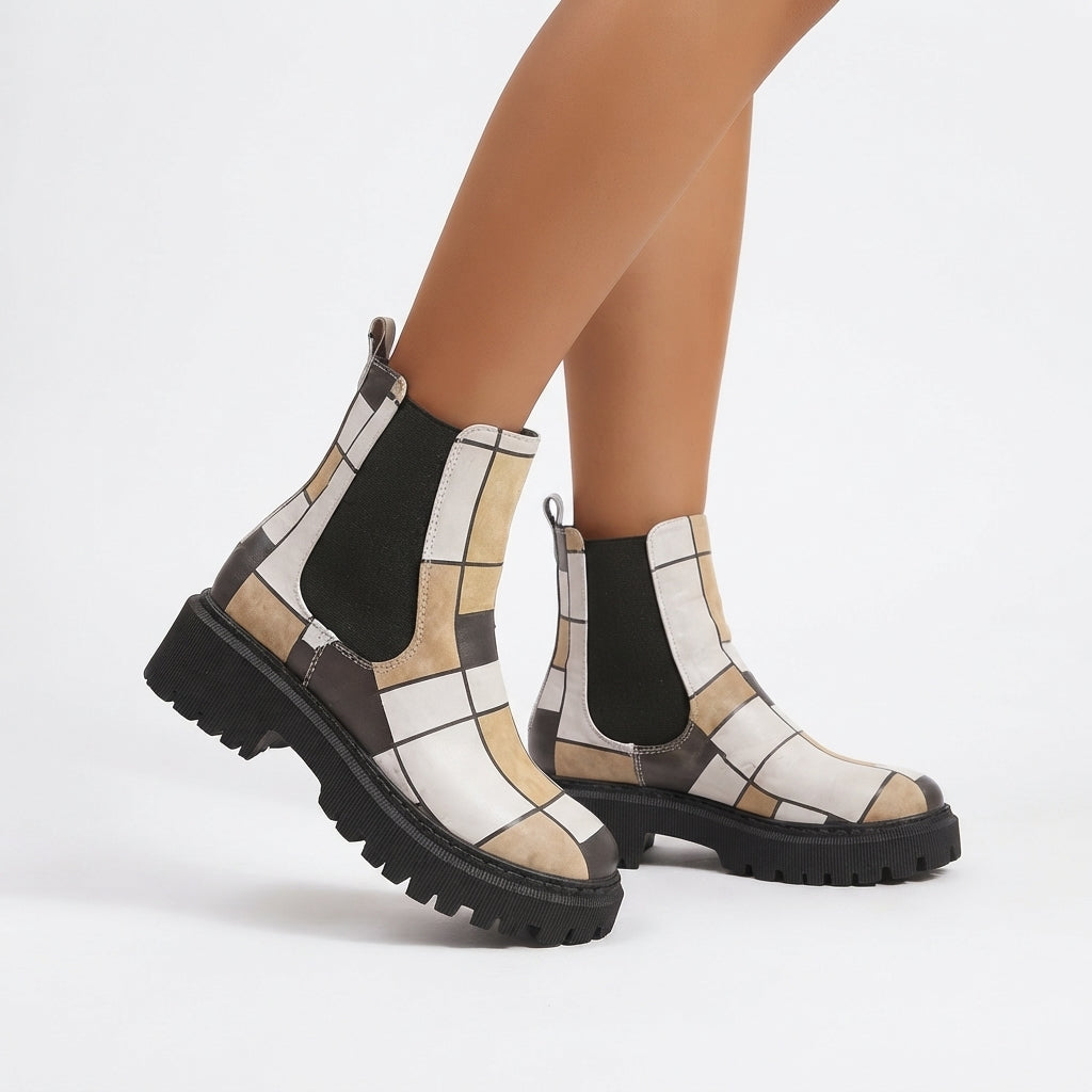 Enkelhoge chelsea boots dames met plateauzool en grove profielzool