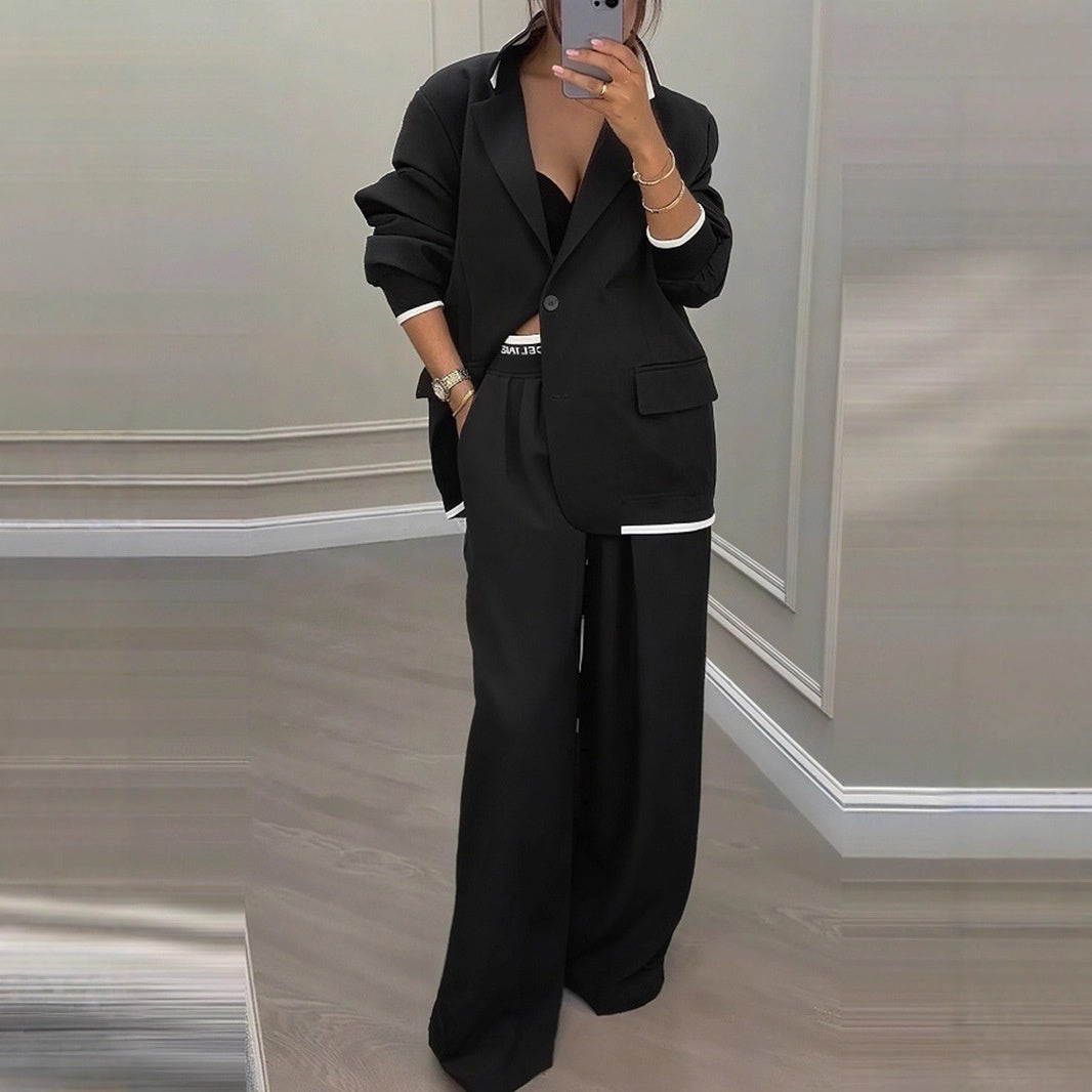 Tweedelige set dames met oversized blazer en wijde broek