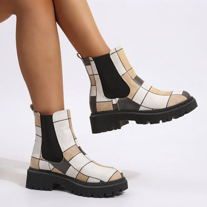 Enkelhoge chelsea boots dames met plateauzool en grove profielzool
