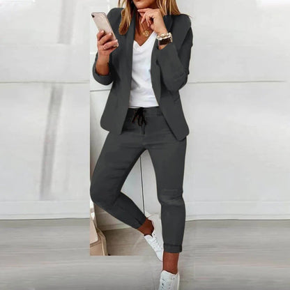 Tweedelige set dames met open blazer en joggingbroek met trekkoord
