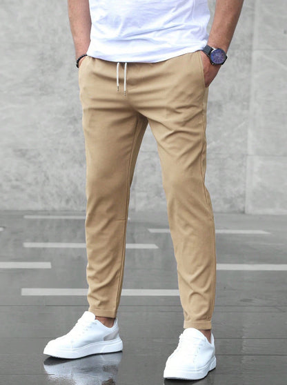 Slim fit broek heren met elastische tailleband en tapstoelopende pijpen