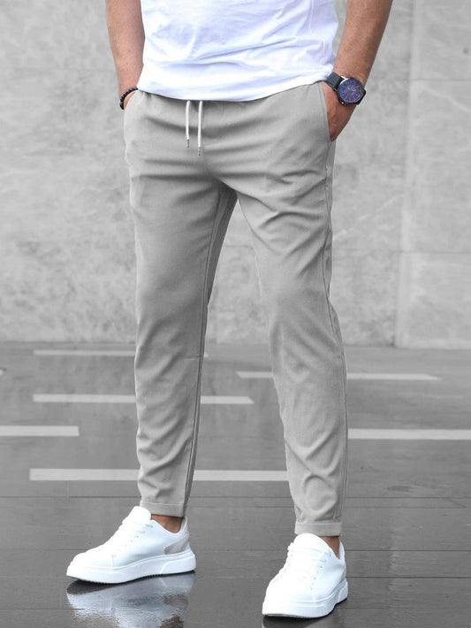 Slim fit broek heren met elastische tailleband en tapstoelopende pijpen