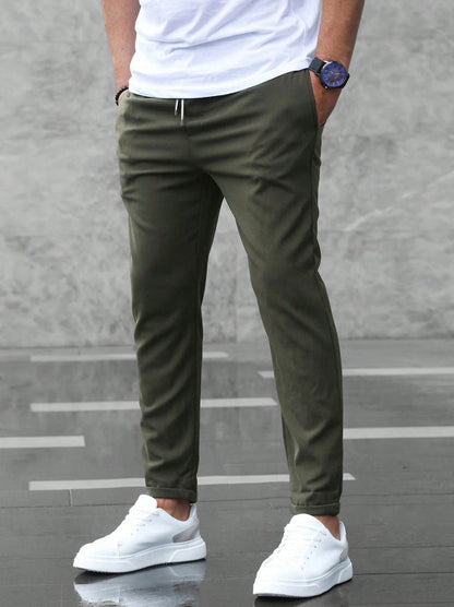 Slim fit broek heren met elastische tailleband en tapstoelopende pijpen