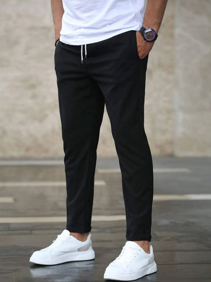 Slim fit broek heren met elastische tailleband en tapstoelopende pijpen