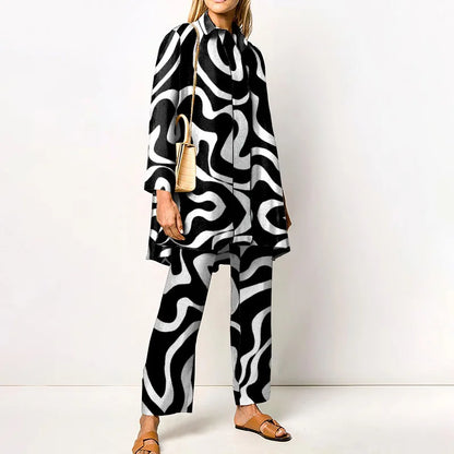 Tweedelige set dames met lange blouse en rechte broek met print