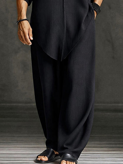 Tweedelige set heren met asymmetrische top en wijde broek