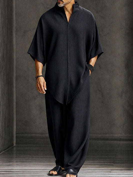 Tweedelige set heren met asymmetrische top en wijde broek