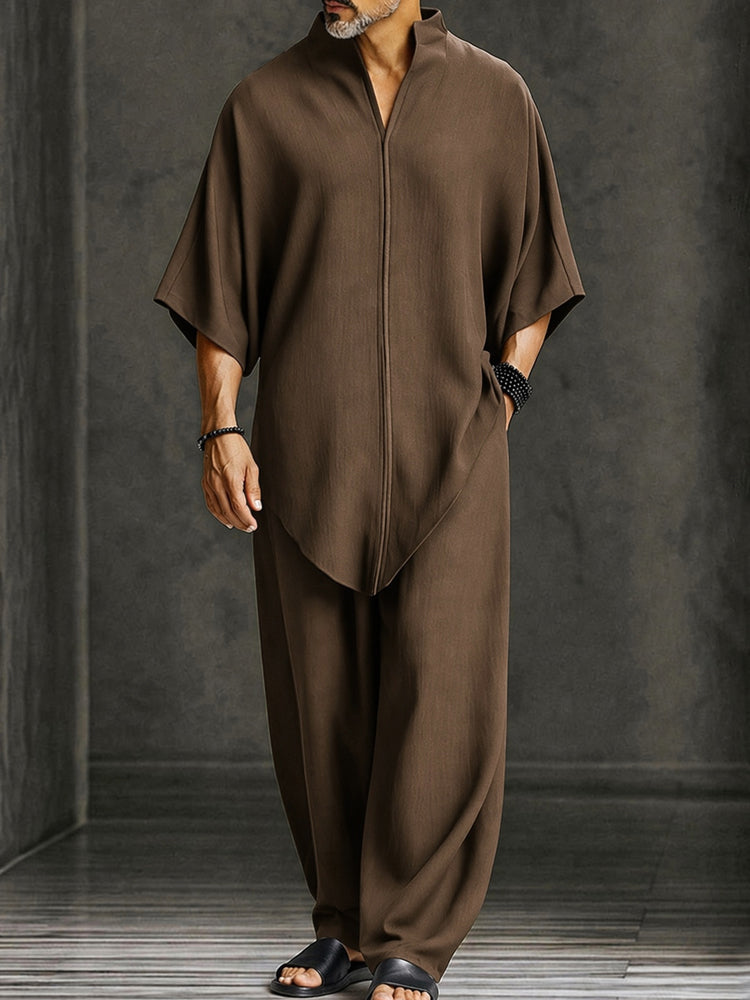 Tweedelige set heren met asymmetrische top en wijde broek