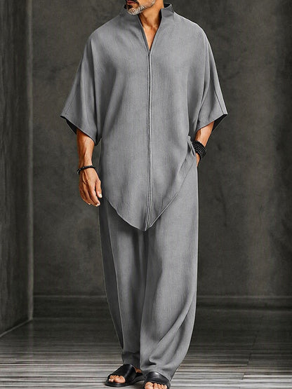 Tweedelige set heren met asymmetrische top en wijde broek