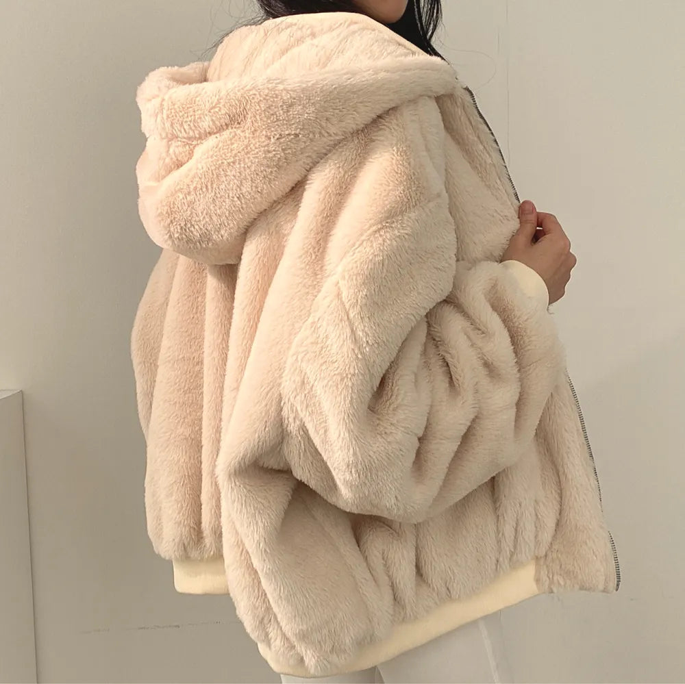 Omkeerbare teddy winterjas dames met capuchon en rits