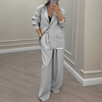 Tweedelige set dames met oversized blazer en wijde broek