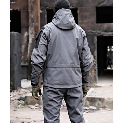 Tactische outdoorset heren met capuchonjas en cargobroek