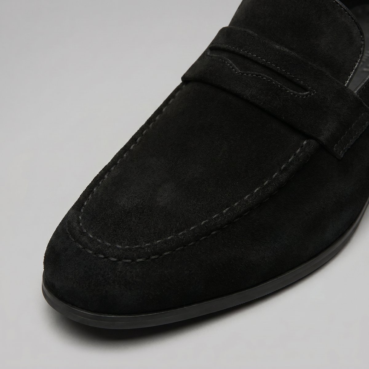 Penny loafers voor heren met wreefband en lage platte hak