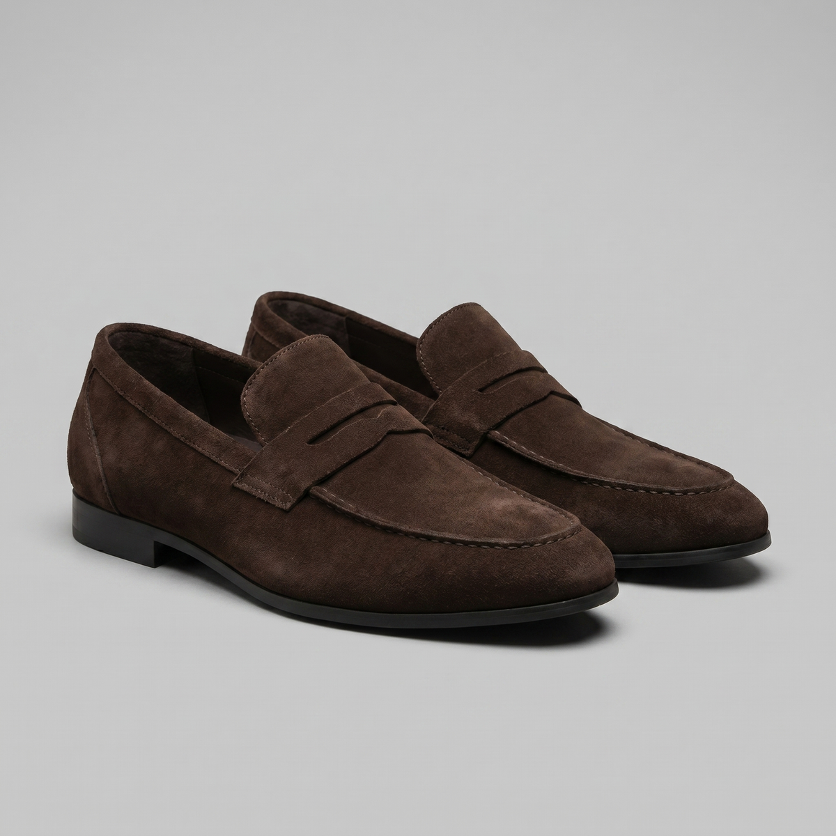 Penny loafers voor heren met wreefband en lage platte hak